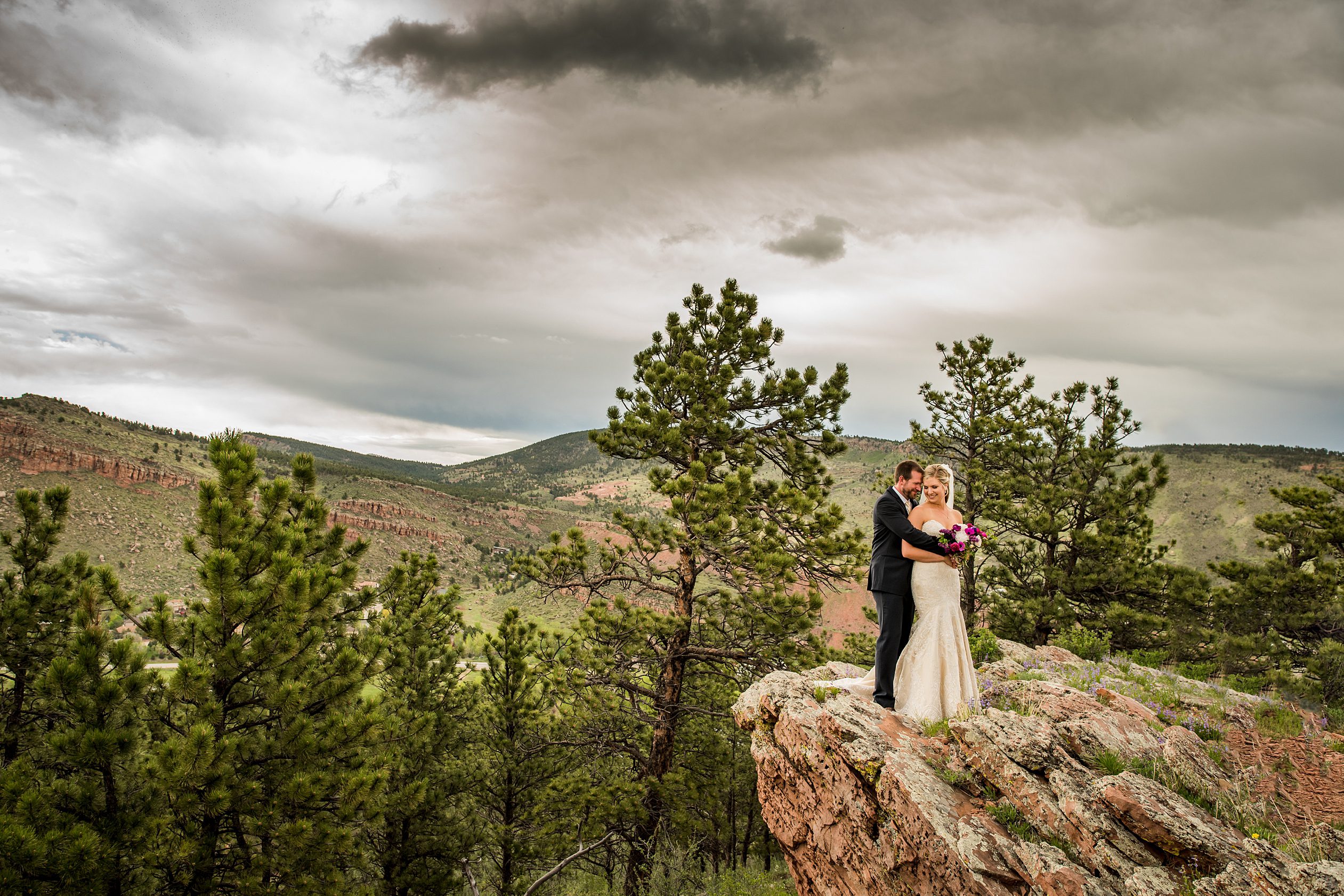 bride and groom durning sunset at their Colorado Mountain venue