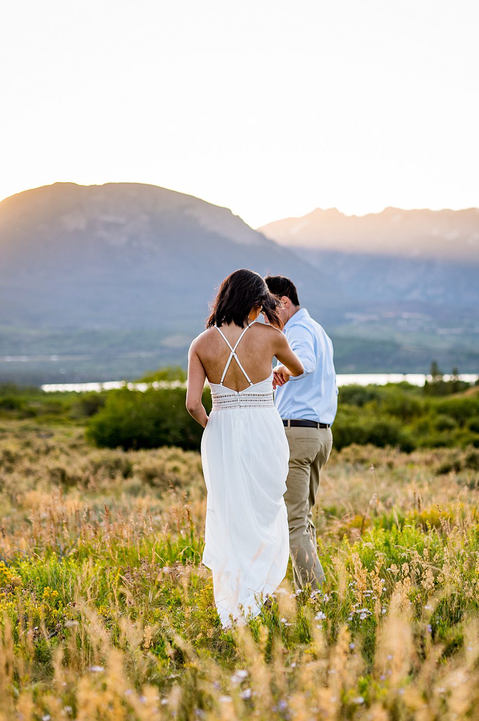 engaged couple walking in Breckenridge
