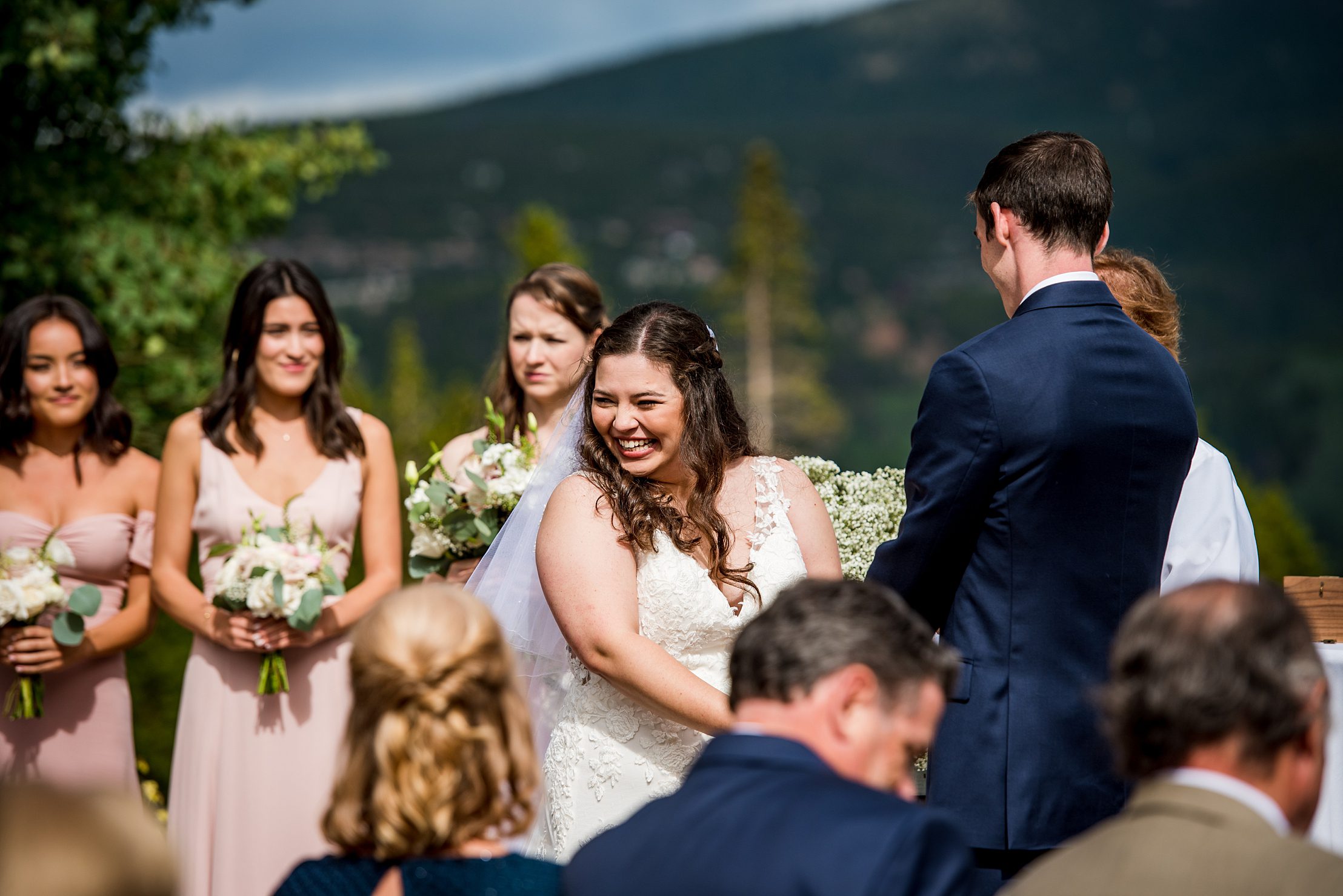 bride smiling during wedding ceremony in Breckenridge, CO
