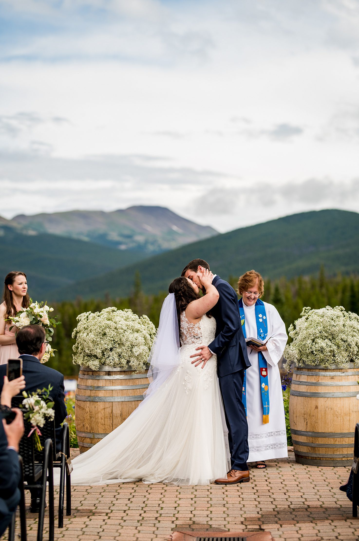 bride and groom have their first kiss at Ten Mile Station