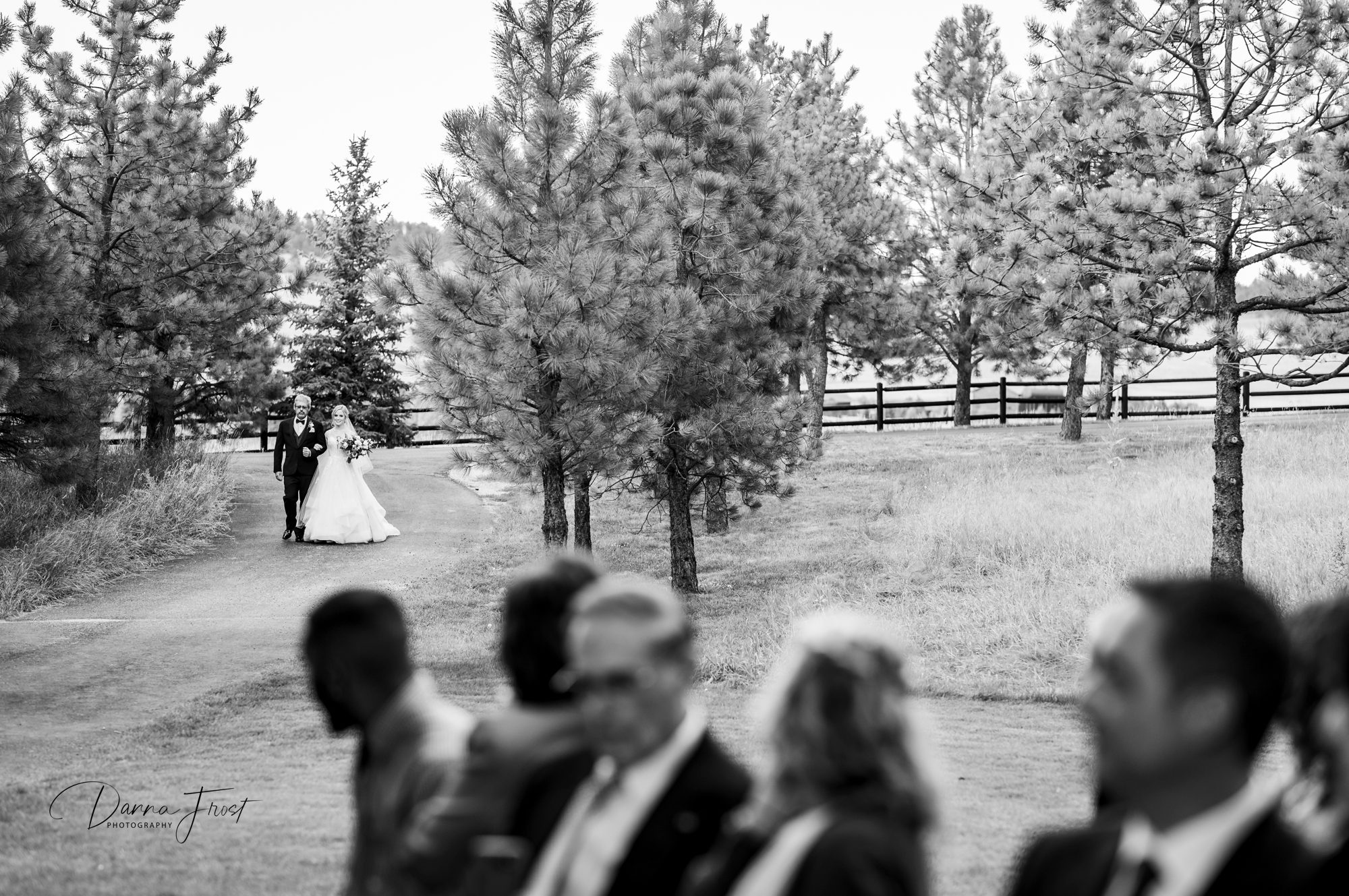 bride and father of the bride walking to the wedding ceremony
