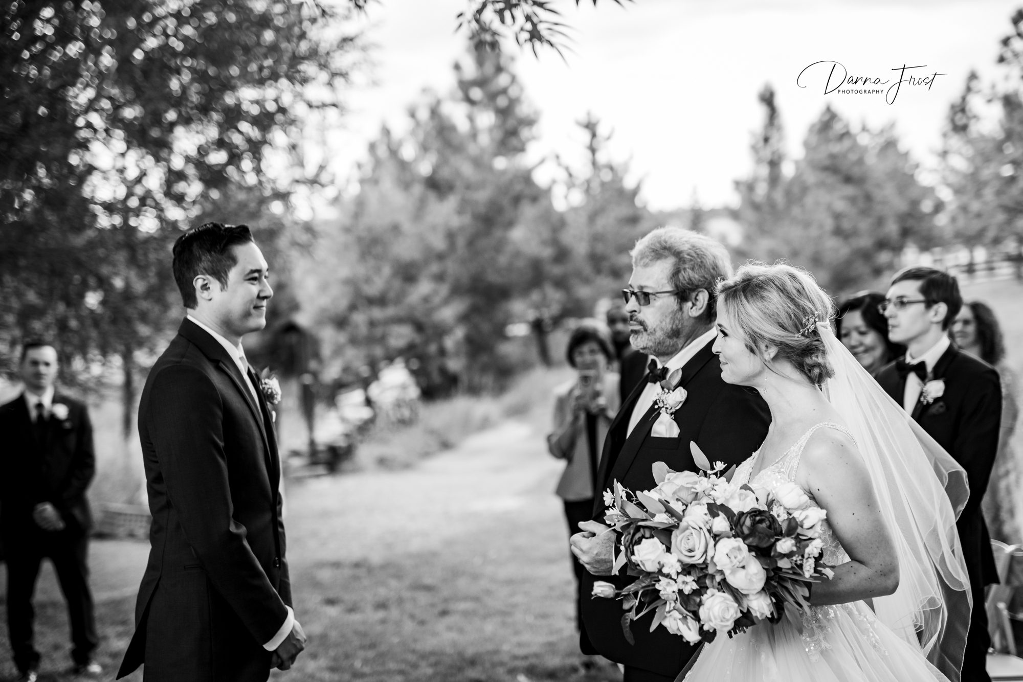 father of the bride giving away his daughter