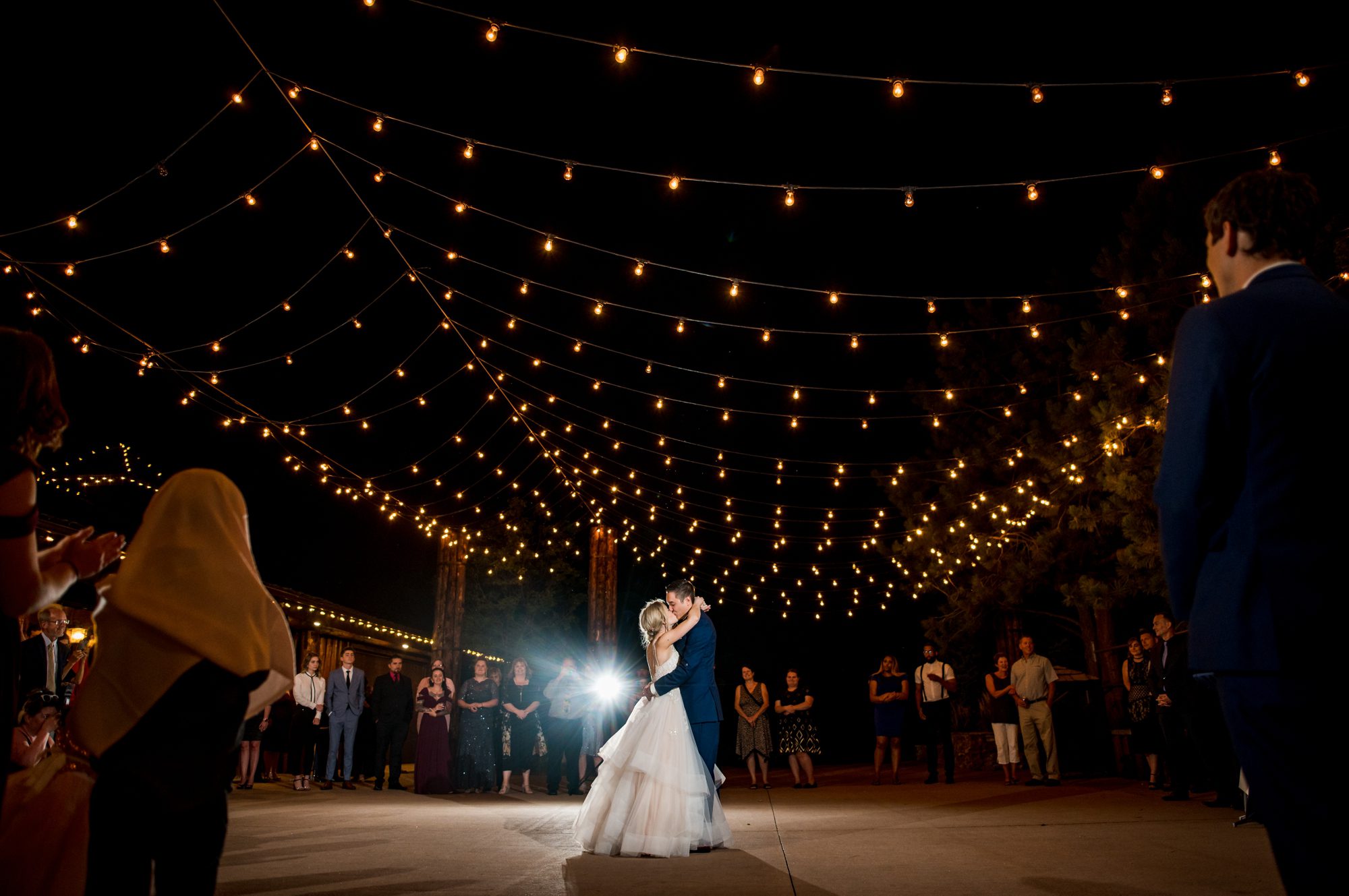 wedding couple kisses during first dance in Colorado