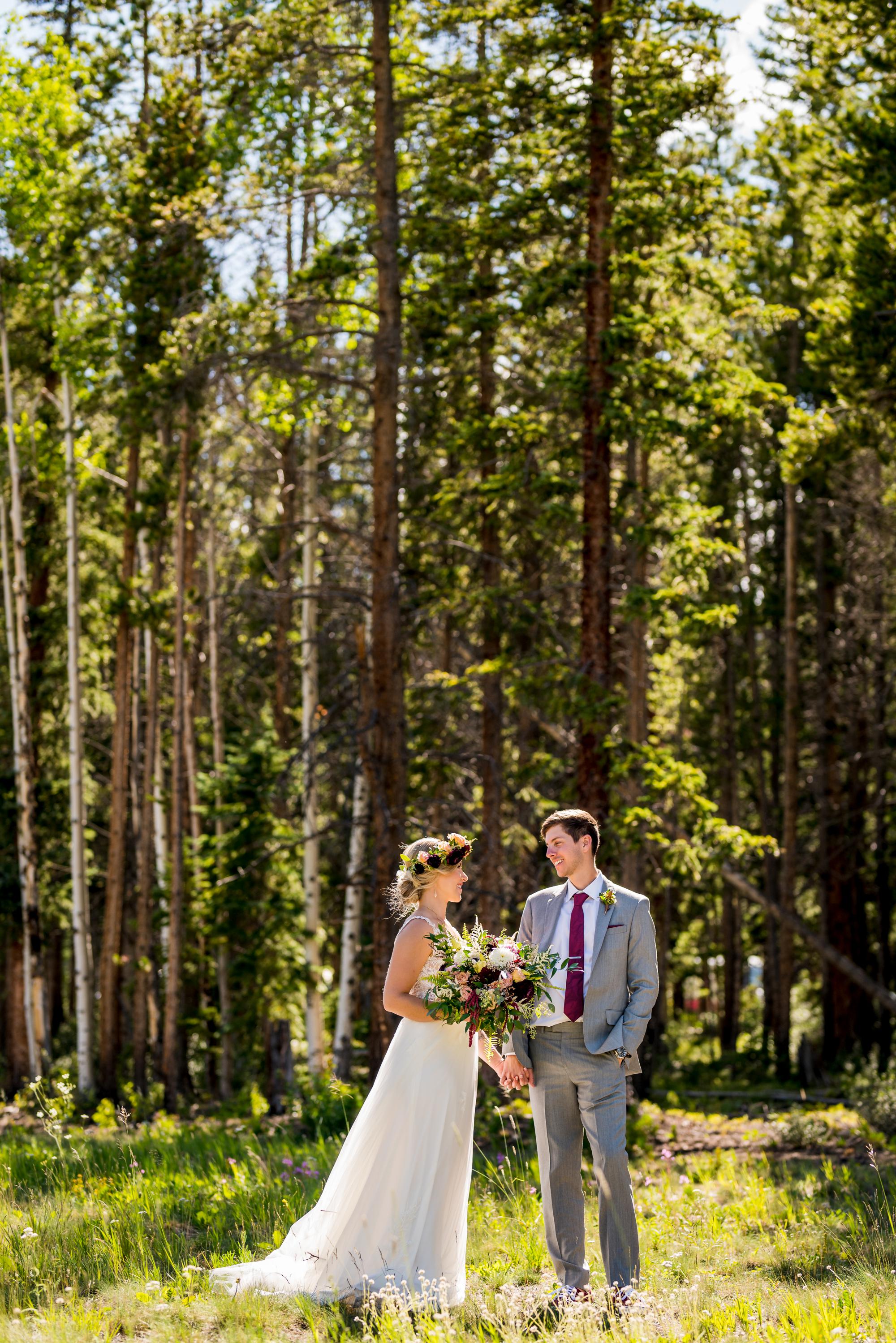 Colorado wedding couple looking at each other in beautiful sunlight