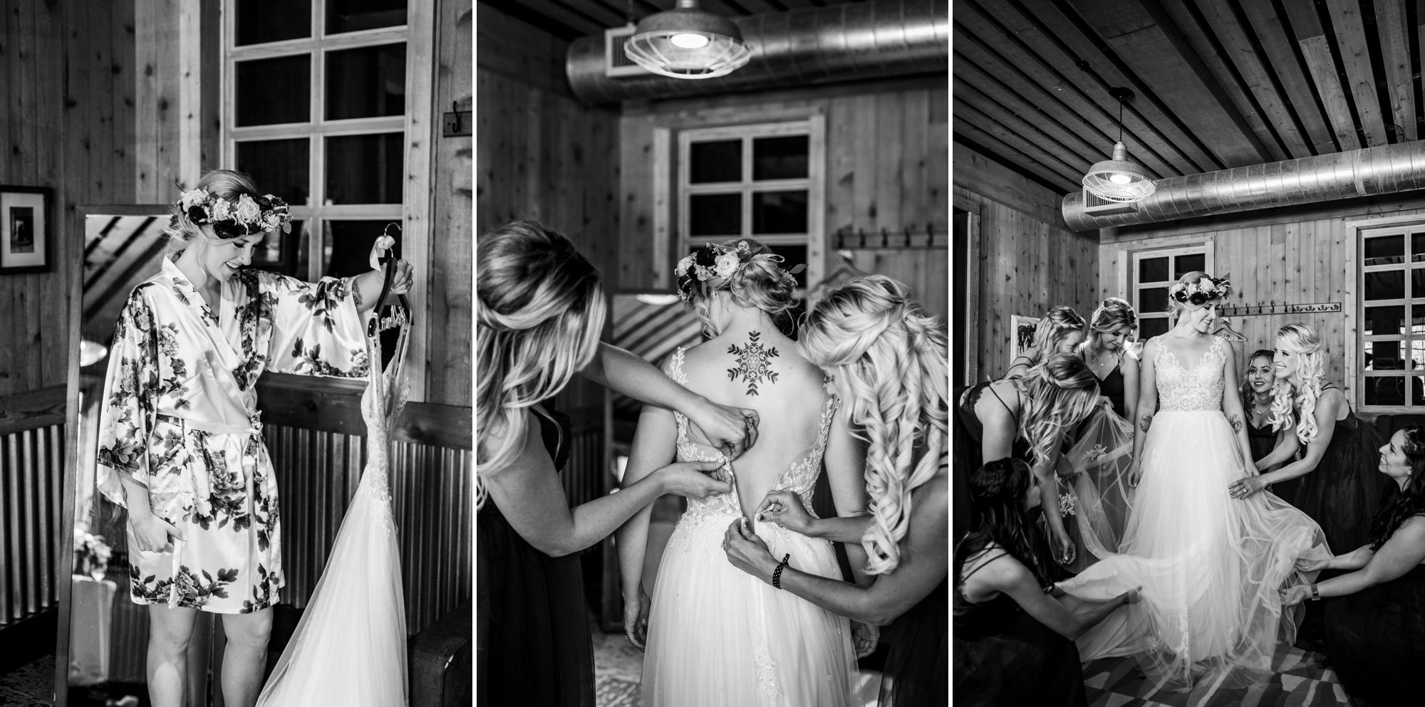 boho bride getting into her wedding dress at ten mile station