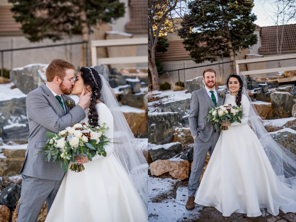 A Colorado bride and groom stand together in front of Wedgewood Brittany Hill, framed by the elegant architecture of the venue and the scenic backdrop of the Denver skyline and surrounding mountains. The couple holds each other lovingly, capturing the beauty and romance of their wedding day.